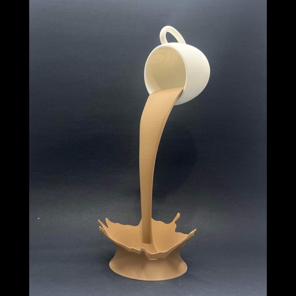 3D printed tan and white floating cup